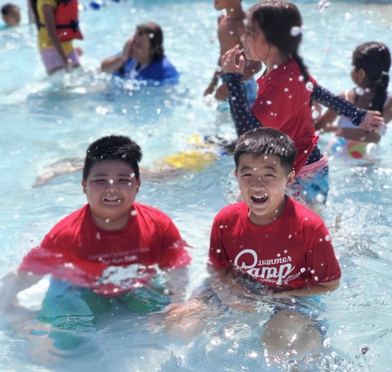 Students engaged in a hands-on learning experience during a school field trip.