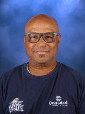 Daryl Davis, Campbell Christian Schools staff member, smiling in a professional school setting