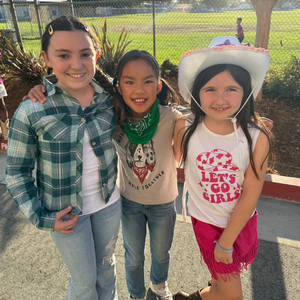 Illustration of multiple children with a discount tag, representing family savings at Campbell Christian Schools