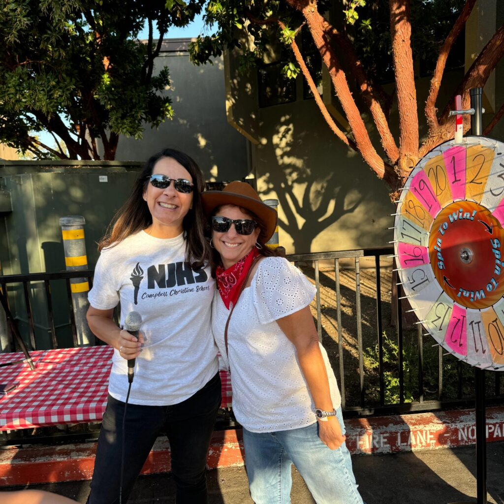 Parents and teachers collaborating at a Campbell Christian Schools Parent Teacher Fellowship meeting.