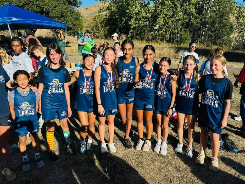 Students practicing sports and athletic skills under coach supervision at Campbell Christian Schools.