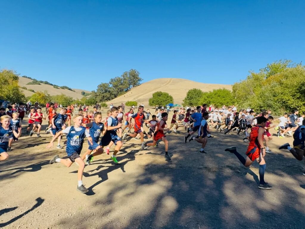 Students enjoying spring sports at Campbell Christian Schools, running, throwing, and playing as part of their team activities.