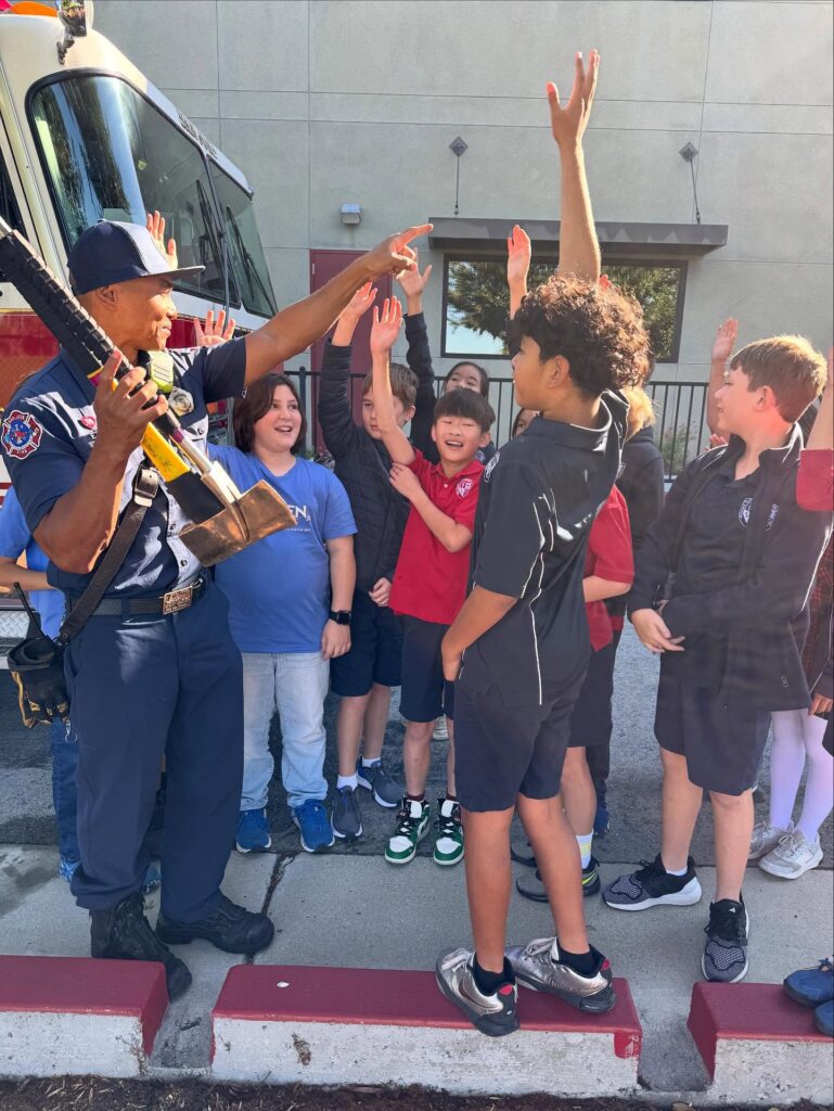Junior high students collaborating in a classroom, engaged in active learning and discussion.