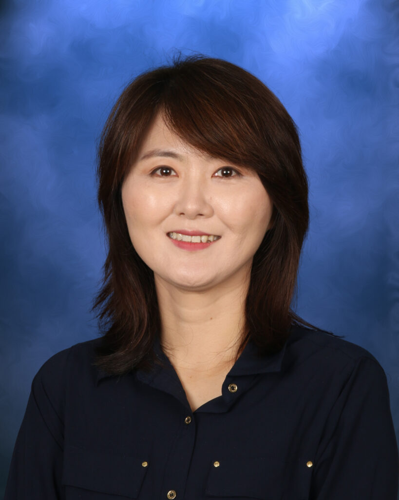 Bora Im, Campbell Christian Schools staff member, interacting with students in a classroom setting