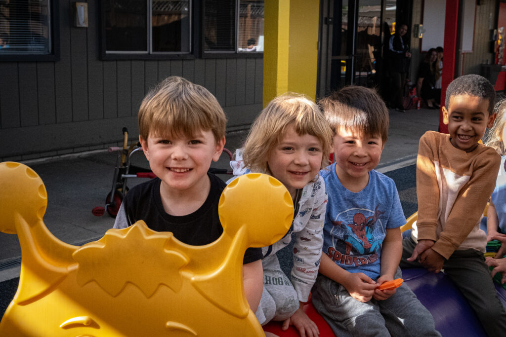 Students participating in various enrichment activities, including art, music, STEM, and sports, in a vibrant school setting.