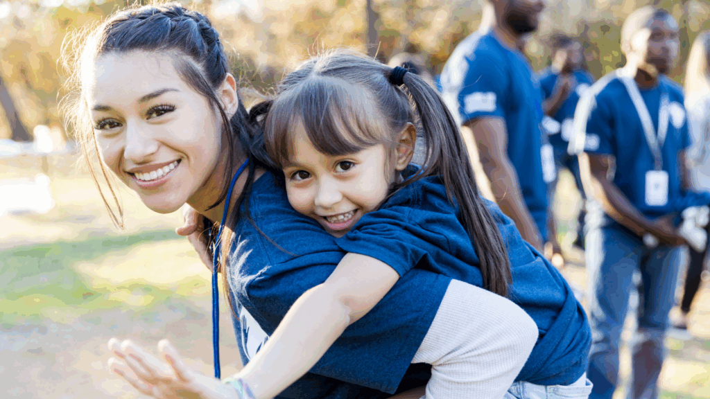 Students and families engaged in a school service activity together.