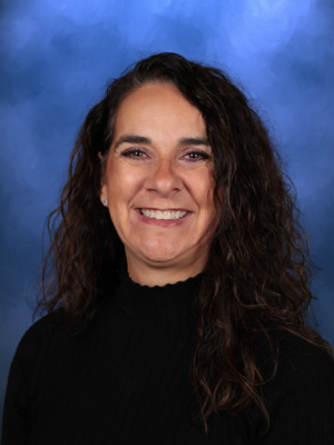 Celeste Gaither, Campbell Christian Schools staff member, smiling in a welcoming school environment