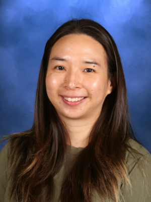 Witchaya (Mynk) Wiboonsrisatja, Campbell Christian Schools staff member, engaging with students in a classroom activity