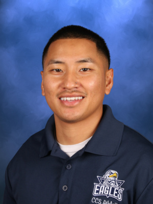 Brian Kaewkan, Campbell Christian Schools staff member, smiling in a classroom or school setting