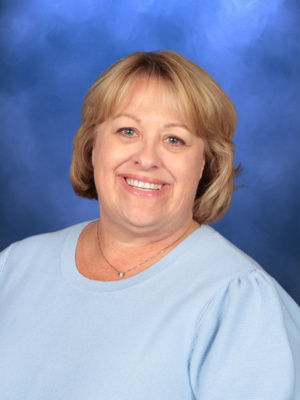 Rhonda Jose, Campbell Christian Schools staff member, smiling in a school environment