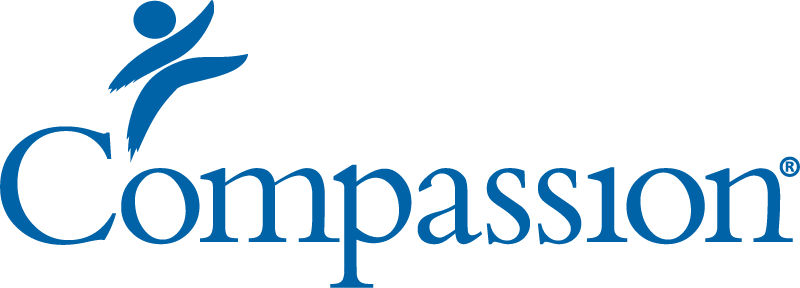 Students participating in a Compassion International program, learning about global service and giving.