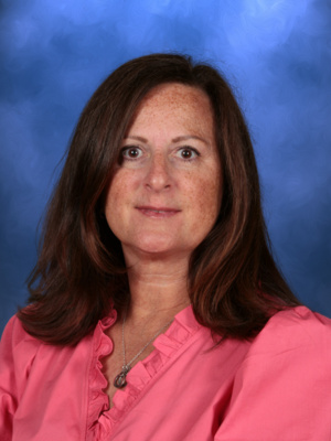 Catherine Hickinbotham, Campbell Christian Schools staff member, smiling and interacting with students