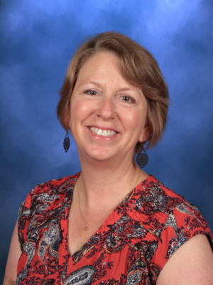 Lisa LeSage, Campbell Christian Schools staff member, smiling in a classroom or campus setting