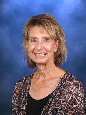 Lisa Fanjoy, Campbell Christian Schools staff member, smiling in a warm and welcoming classroom environment
