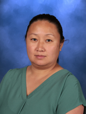 Lan Li, Campbell Christian Schools staff member, smiling in a school or classroom setting