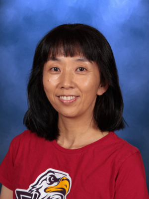 Minako Schweitzer, Campbell Christian Schools staff member, guiding students in classroom activities